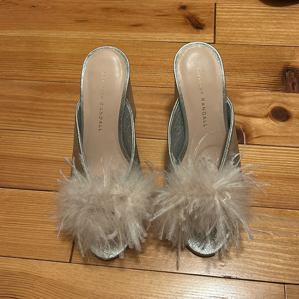 Like new Loefflwr Randall silver heels with feathery toe detail